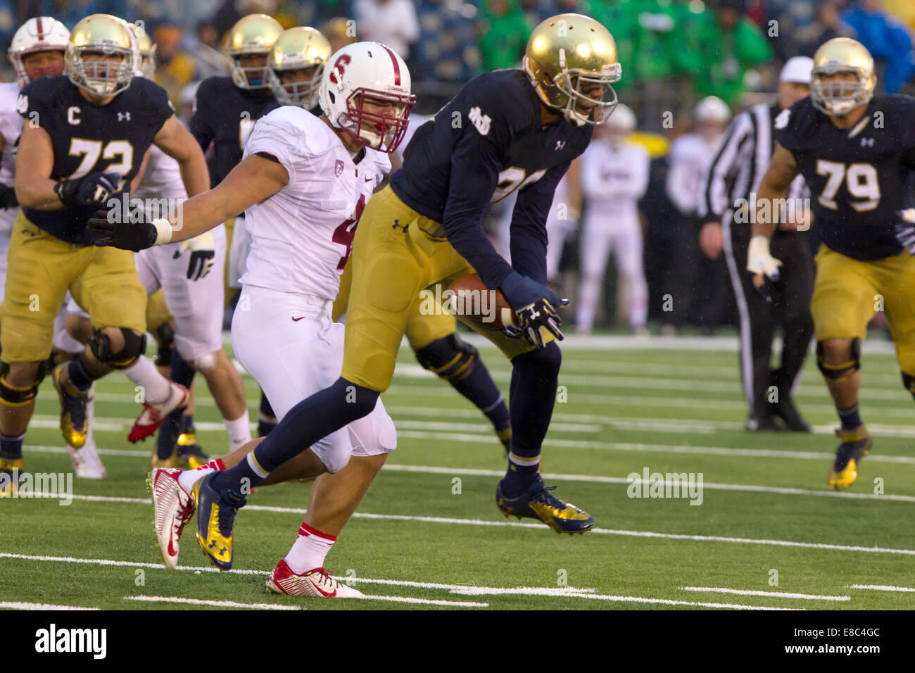 South Bend, Indiana, USA. 4th Oct, 2014. Notre Dame WR COREY ROBINSON (88) makes a juggling catch against Stanford ILB BLAKE MARTINEZ (4) during the fourth quarter. The Notre Dame Fighting Irish beat the Stanford Cardinal 17-14 at Notre Dame Stadium in South Bend, Indiana. Credit:  Frank Jansky/ZUMA Wire/Alamy Live News Stock Photo