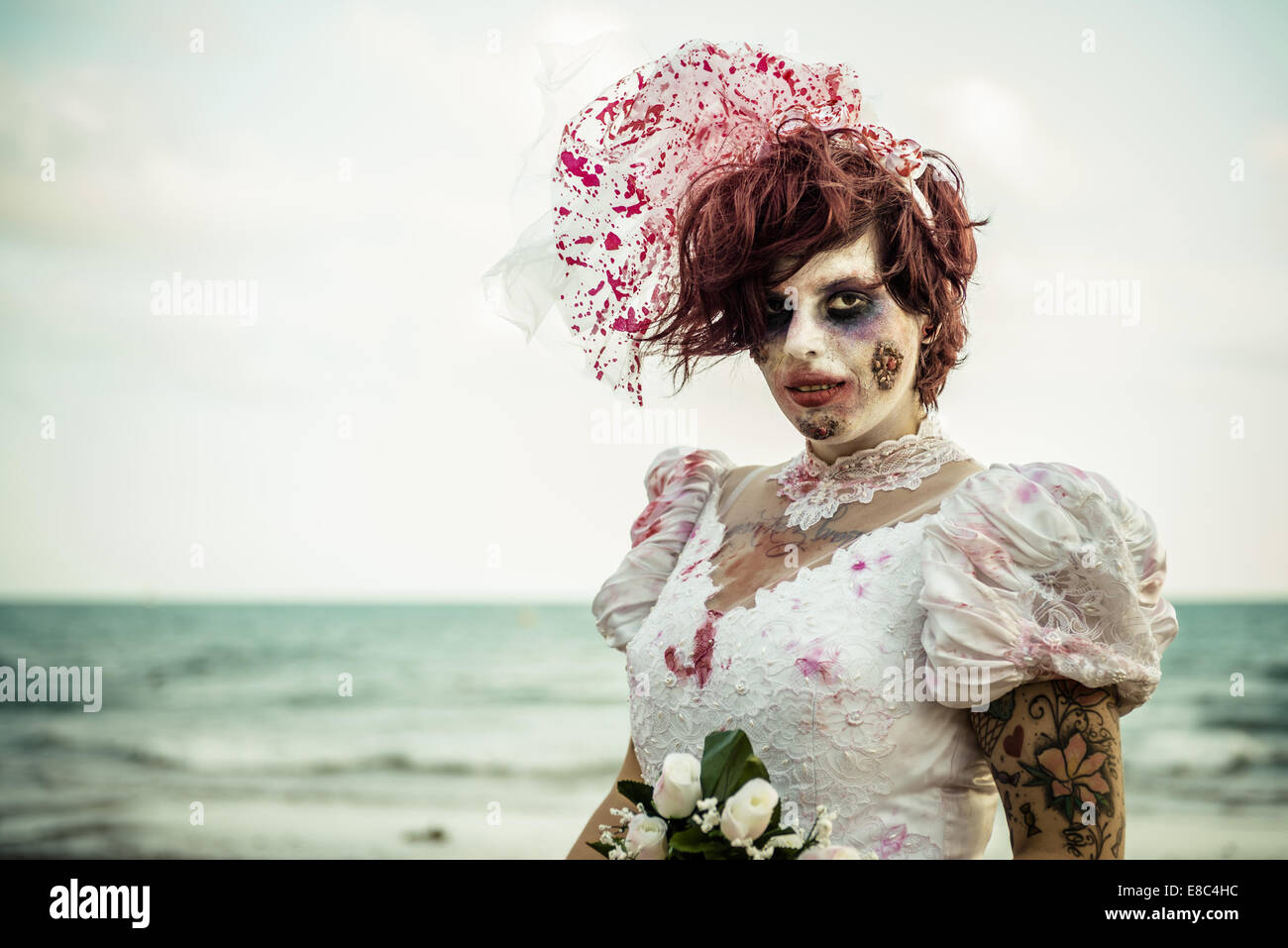 Sitges, Spain. 4th Oct, 2014. A woman dressed as a bride zombie takes part in the Sitges Zombie Walk 2014 Credit:  Matthias Oesterle/ZUMA Wire/ZUMAPRESS.com/Alamy Live News Stock Photo