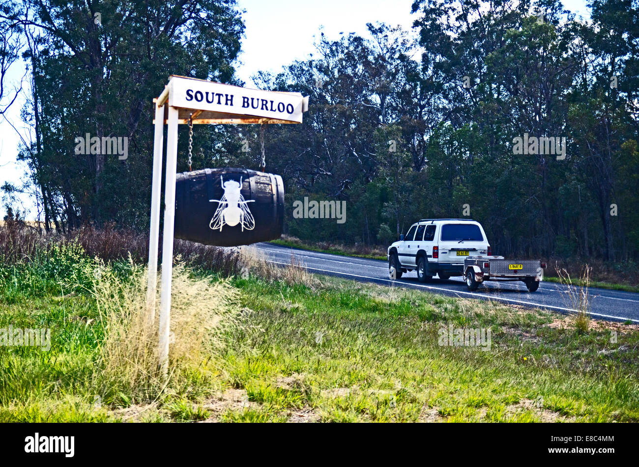 Beer barrel mail box with a blowfly image on Oxley Hwy NSW Australia Stock Photo