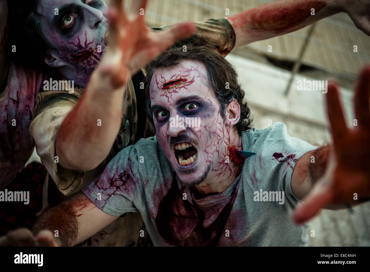 Sitges, Spain. 4th Oct, 2014. Zombies advance on the camera at the Sitges Zombie Walk 2014 Credit:  Matthias Oesterle/ZUMA Wire/ZUMAPRESS.com/Alamy Live News Stock Photo