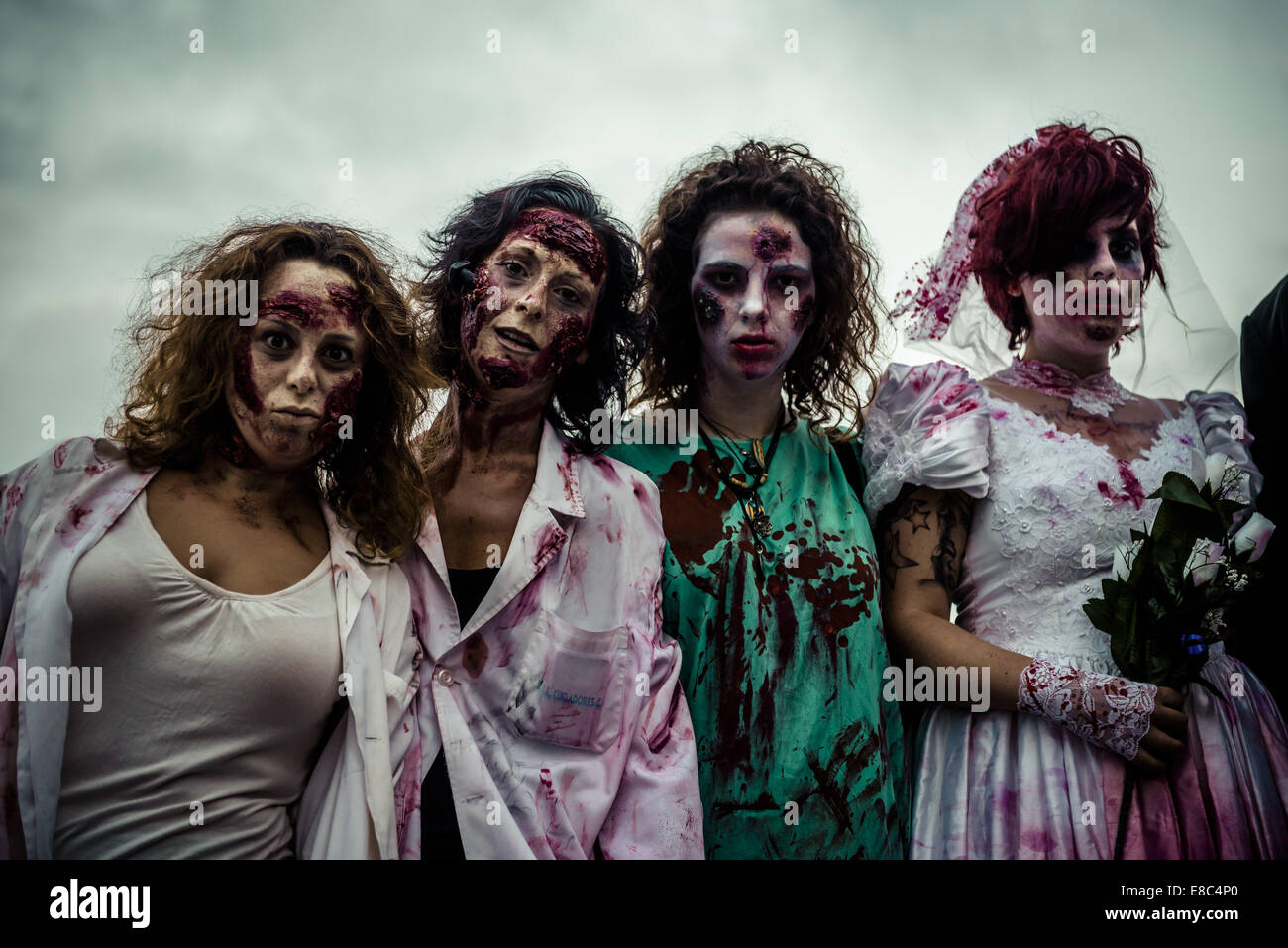 Sitges, Spain. 4th Oct, 2014. Women made-up as zombies take part in the Sitges Zombie Walk 2014 Credit:  Matthias Oesterle/ZUMA Wire/ZUMAPRESS.com/Alamy Live News Stock Photo