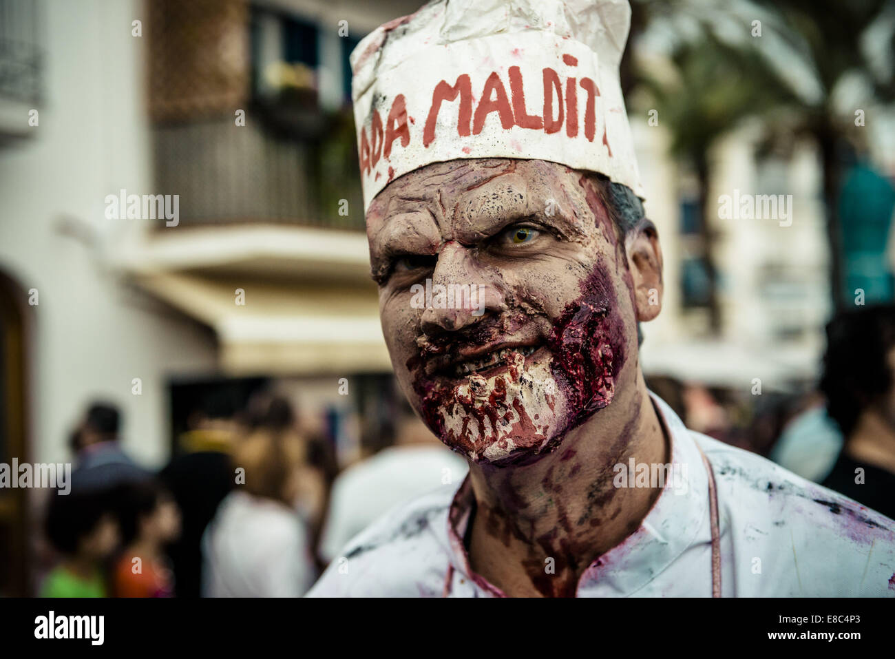 Sitges, Spain. 4th Oct, 2014. A butcher like dressed man is made-up as a zombie for the Sitges Zombie Walk 2014 Credit:  Matthias Oesterle/ZUMA Wire/ZUMAPRESS.com/Alamy Live News Stock Photo