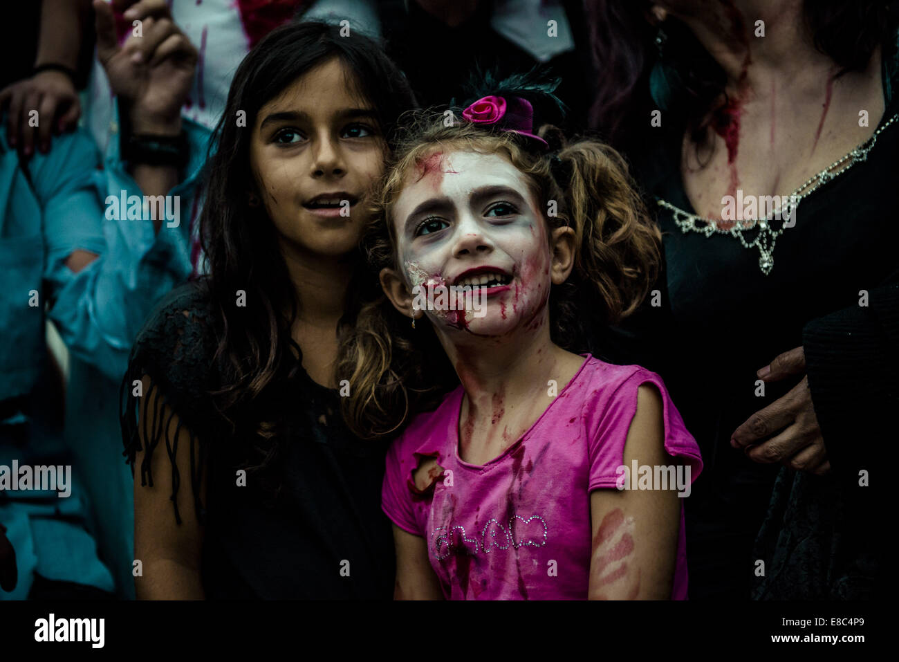 Sitges, Spain. 4th Oct, 2014. A young girl made-up as a zombie takes part in the Sitges Zombie Walk 2014 Credit:  Matthias Oesterle/ZUMA Wire/ZUMAPRESS.com/Alamy Live News Stock Photo