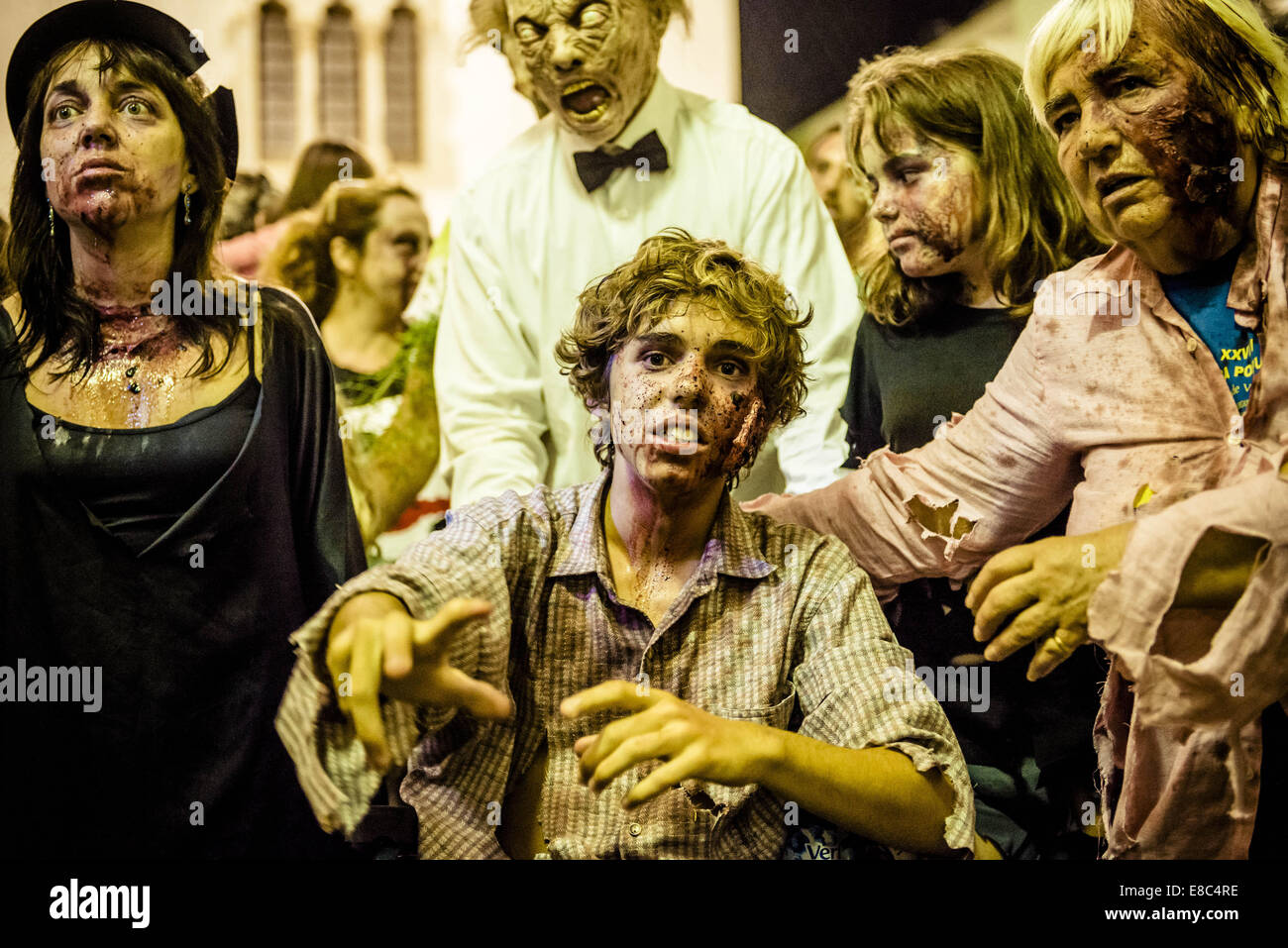 Sitges, Spain. 4th Oct, 2014. Zombies of all kind gather for the Sitges Zombie Walk 2014 Credit: Matthias Oesterle/ZUMA Wire/ZUMAPRESS.com/Alamy Live News Stock Photo