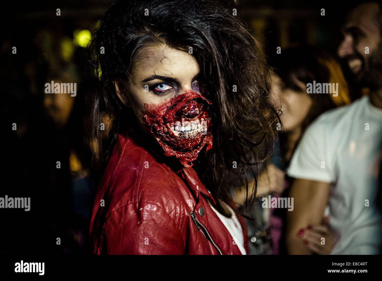 Sitges, Spain. 4th Oct, 2014. A woman made-up as a zombie takes part in the Sitges Zombie Walk 2014 Credit:  Matthias Oesterle/ZUMA Wire/ZUMAPRESS.com/Alamy Live News Stock Photo