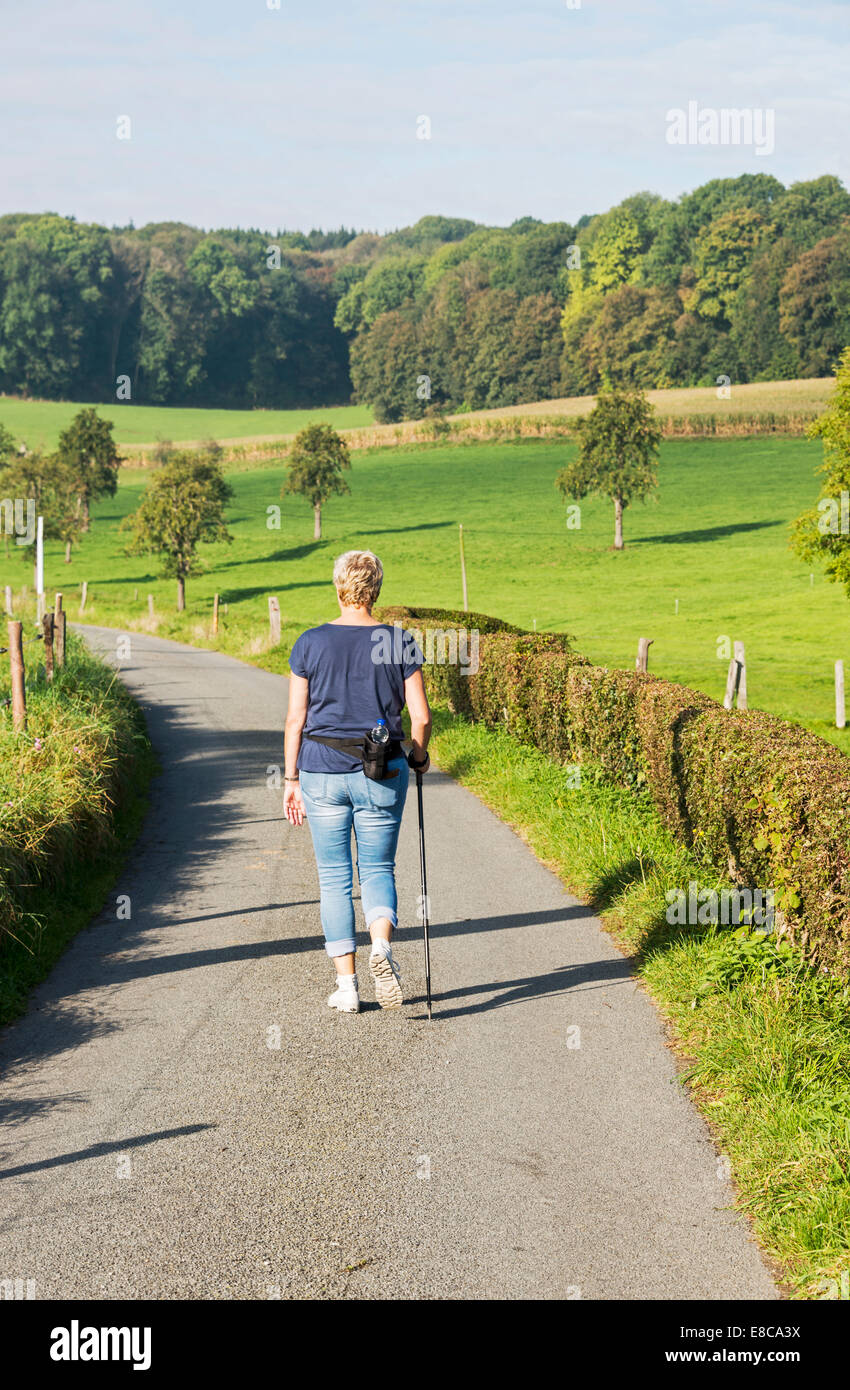Woman walking away summer dress hi-res stock photography and images - Alamy