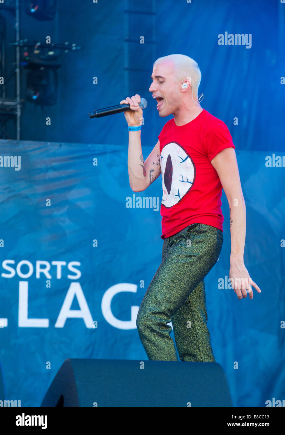 Singer Tyler Glenn of Neon Trees performs on stage at the 2014 iHeartRadio Music Festival Village in Las Vegas. Stock Photo