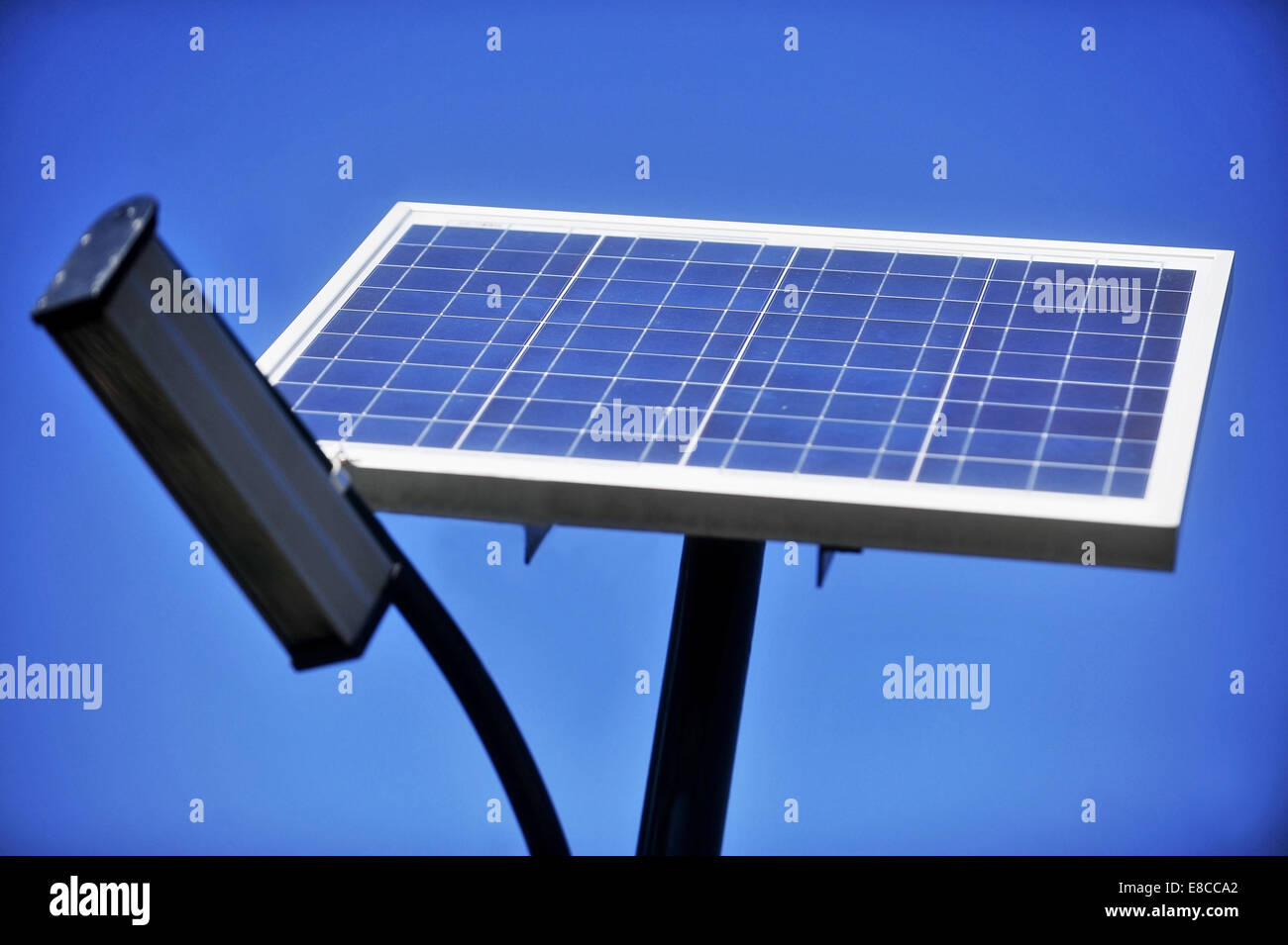 Public lighting pole with photovoltaic panel and blue sky on the background Stock Photo