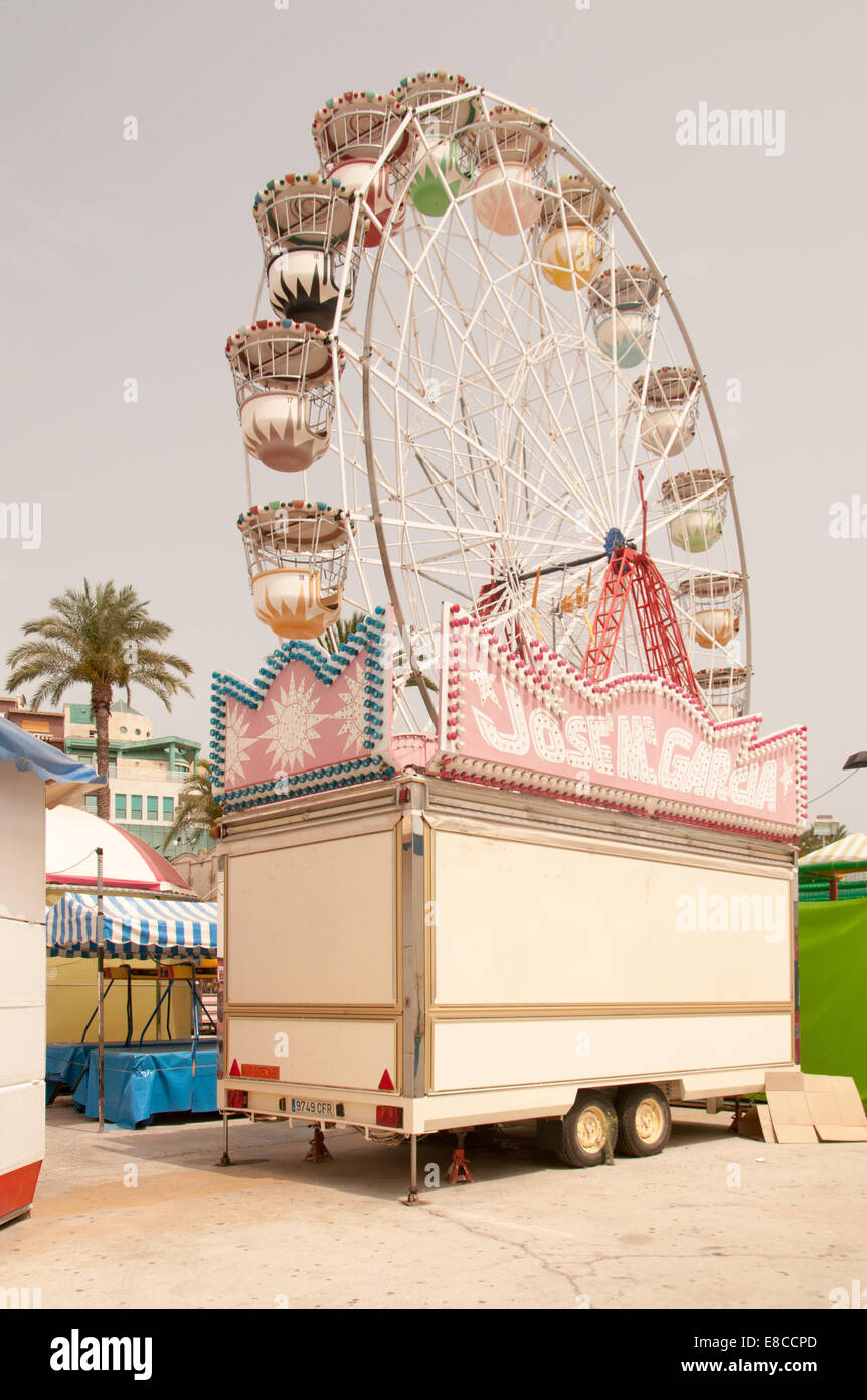 Ferris wheel in Scirocco winds. The ferris wheel in the amusement park ...