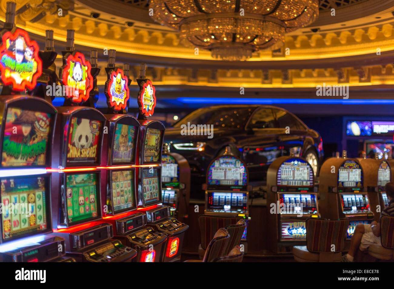 Las Vegas, NV, USA - 13th July 2013: People Playing Slot Machine Games  Inside Las Vegas Casino. Stock Photo, Picture and Royalty Free Image. Image  26254649.