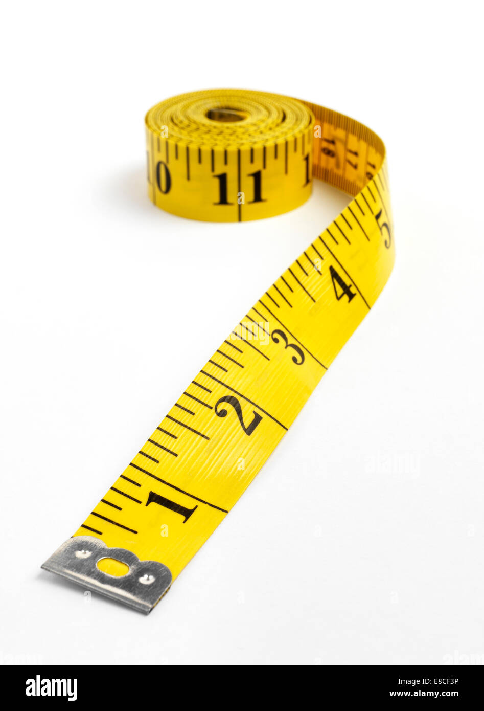 Tailors tape measure cut out against a white background. Blue measuring  tape Stock Photo - Alamy