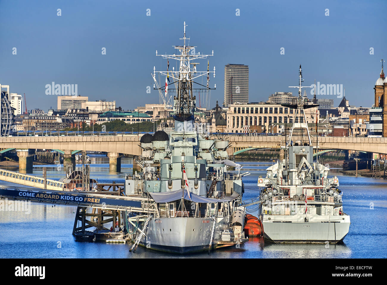 HMS Belfast is a museum ship, originally a Royal Navy light cruiser, permanently moored in London on the River Thames Stock Photo