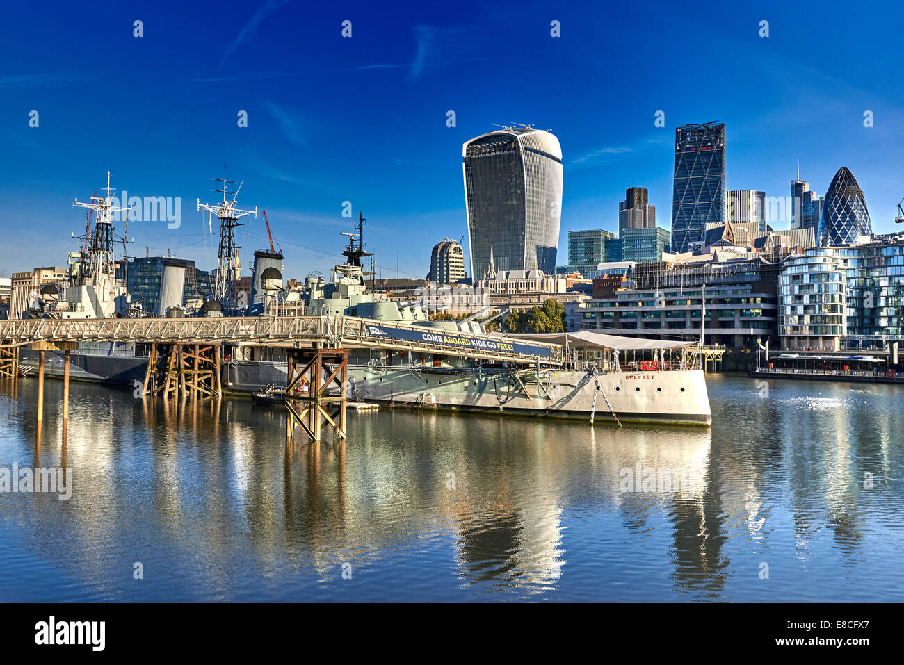 HMS Belfast is a museum ship, originally a Royal Navy light cruiser, permanently moored in London on the River Thames Stock Photo