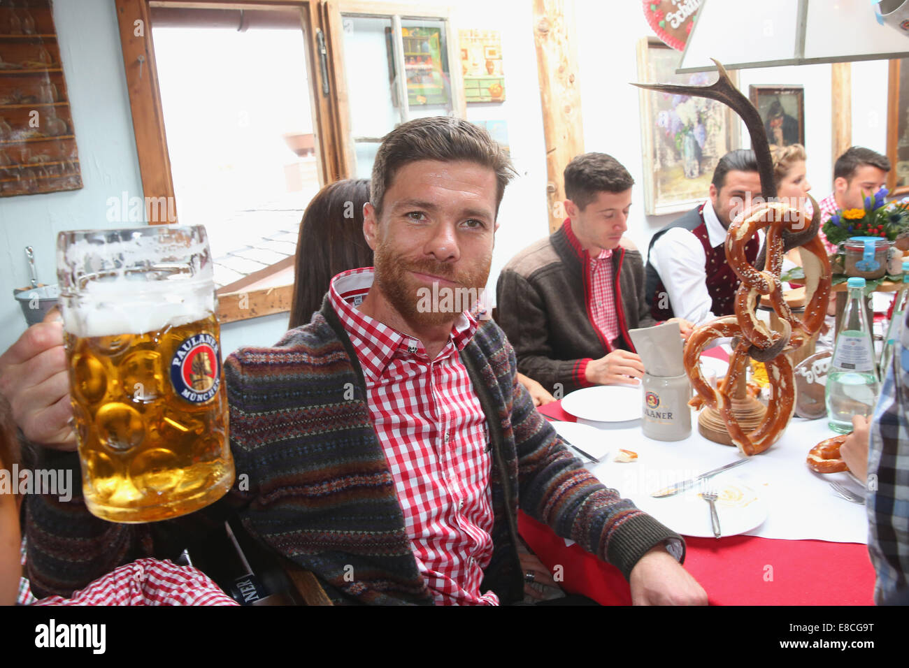 Munich, Germany. 5th Oct, 2014.  Xabi Alonso attends the Oktoberfest beer festival at Kaefer Wiesnschaenke tent at Theresienwiese on October 5, 2014 in Munich, Germany.    Xabi Alonso Credit:  kolvenbach/Alamy Live News Stock Photo