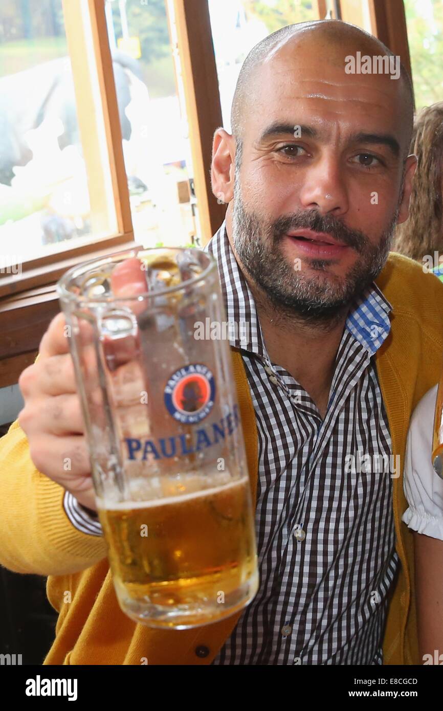 Munich, Germany. 5th Oct, 2014. HANDOUT - Josep Guardiola, head coach of Bayern Muenchen attend the Oktoberfest beer festival at Kaefer Wiesnschaenke tent at Theresienwiese on October 5, 2014 in Munich, Germany. Credit:  dpa/Alamy Live News Stock Photo