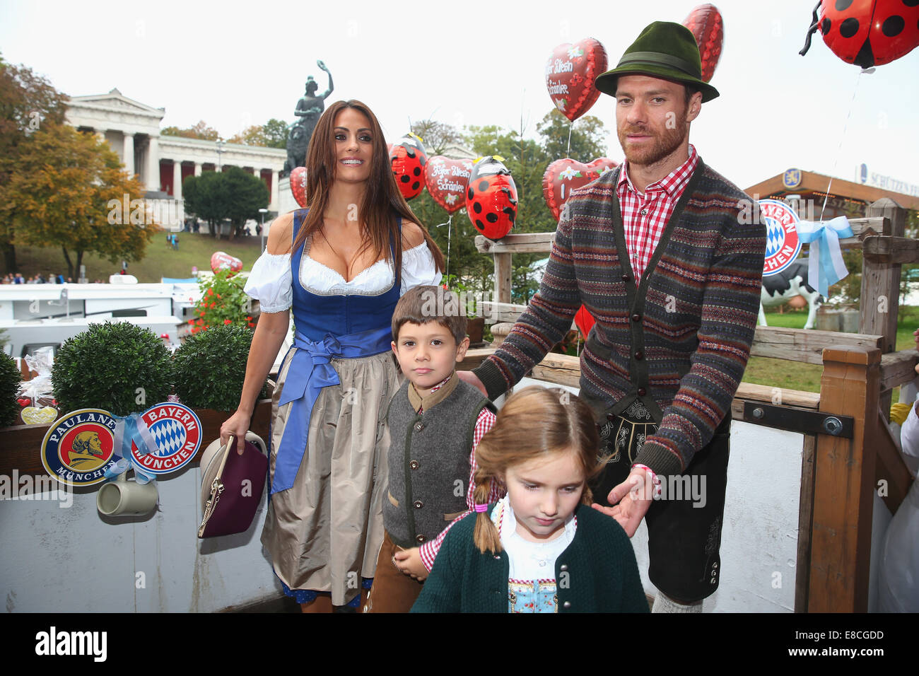 Munich, Germany. 5th Oct, 2014. Xabi Alonso attends with his wife Nagore  Aramburu the Oktoberfest beer festival at Kaefer Wiesnschaenke tent at  Theresienwiese on October 5, 2014 in Munich, Germany. Xabi Alonso;, image size:1300x956