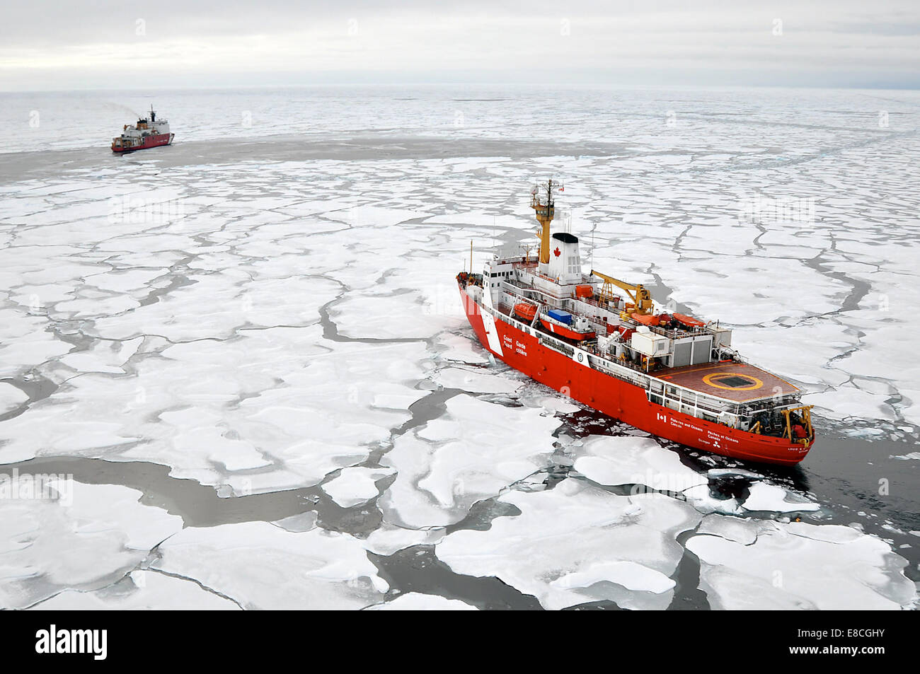 Closing In ARCTIC OCEAN – The Canadian Coast Guard Ship Louis S. St-Laurent makes an approach to the Coast Guard Cutter Healy in the Arctic Ocean Sept. 5, 2009. The two ships are taking part in a multi-year, multi-agency Arctic survey that will help defin Stock Photo