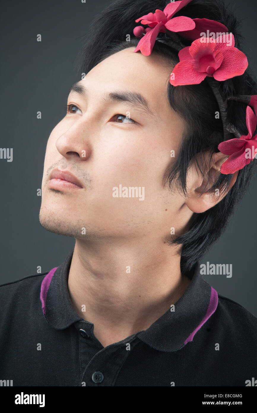 Portrait of a Man in a flower headband Stock Photo
