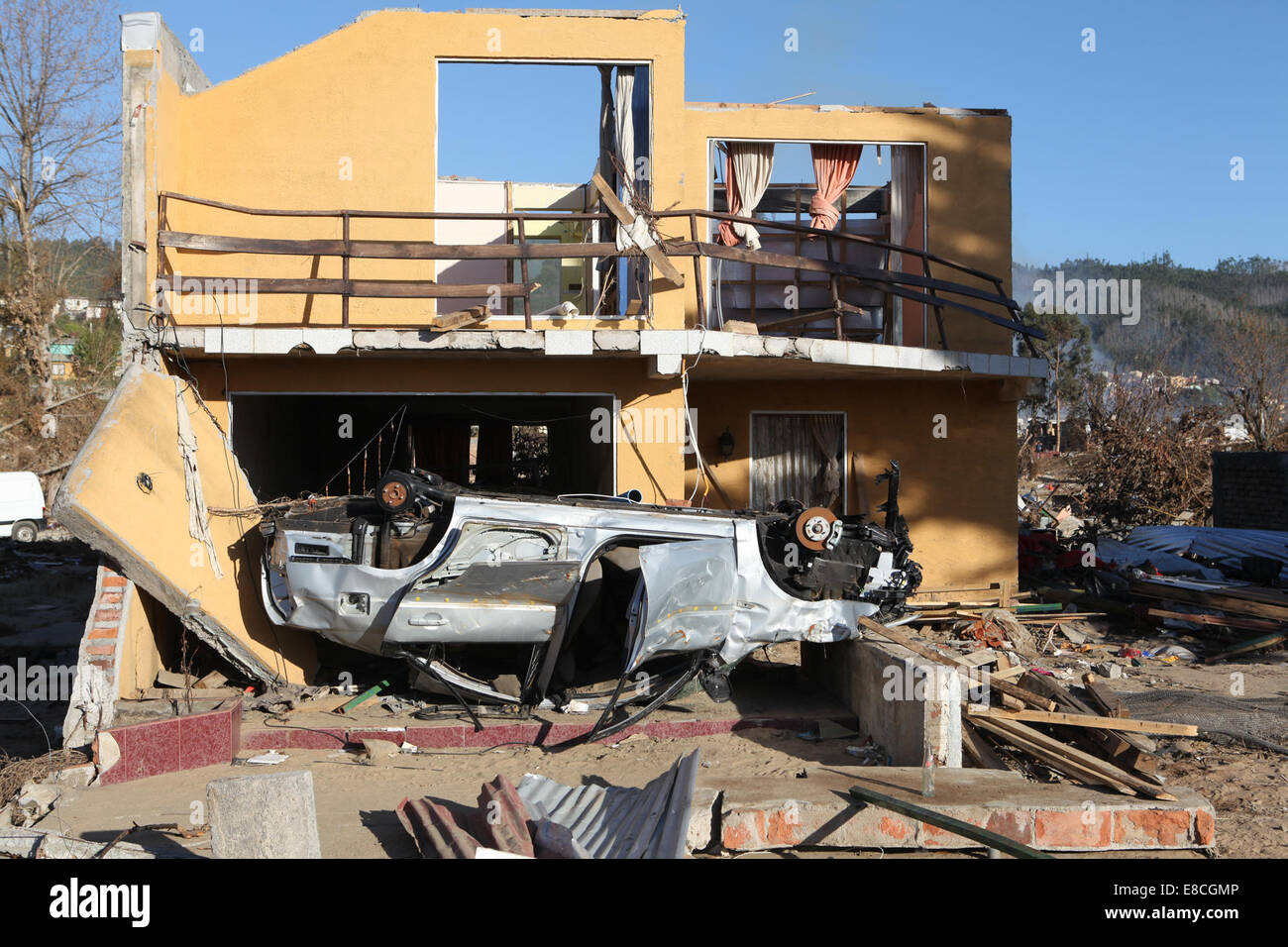 House and Car Destroyed by Tsunami Stock Photo