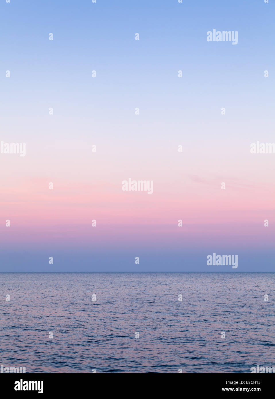 Evening sky natural colorful gradient over the sea water, abstract empty background Stock Photo