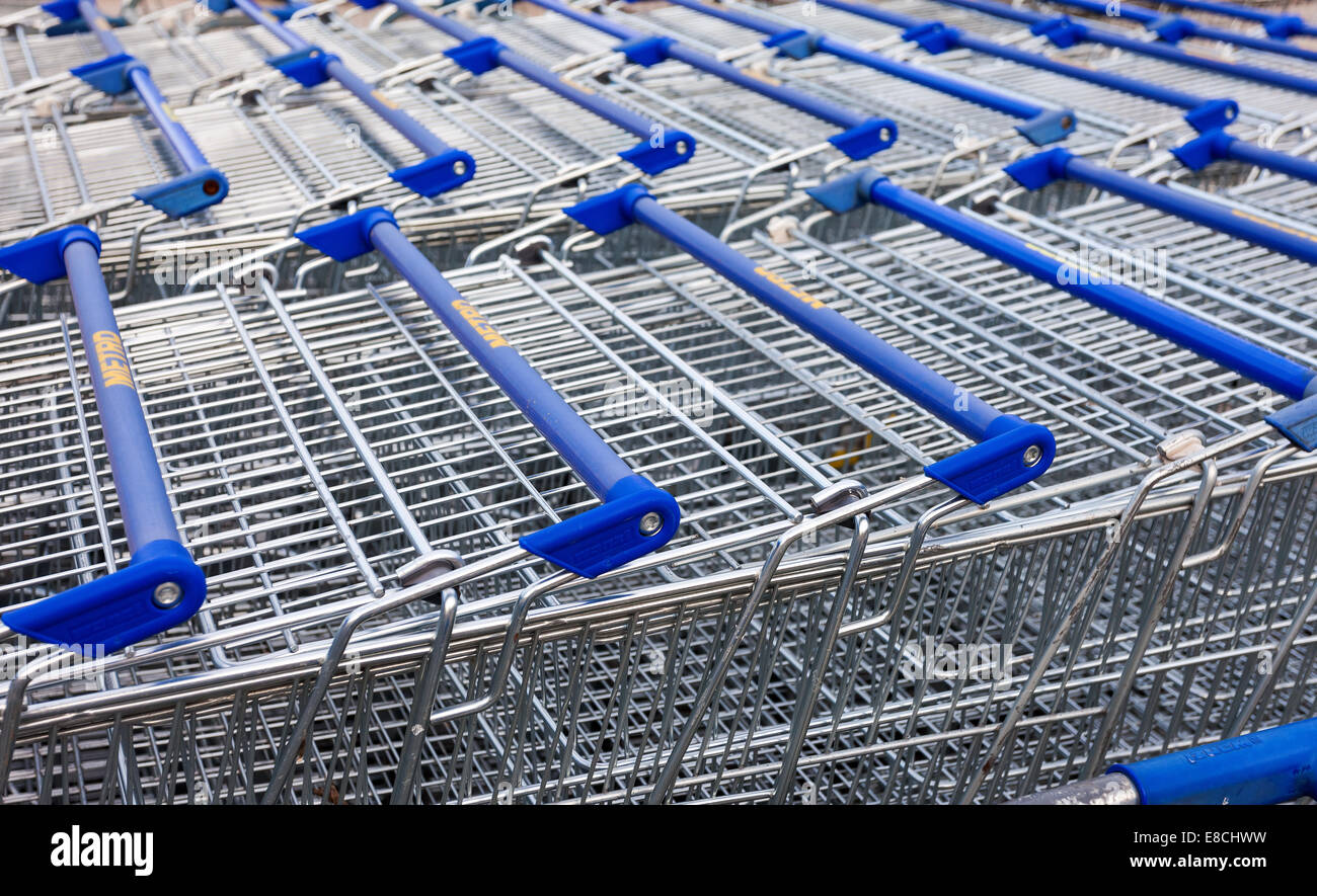 Large empty blue shopping cart Metro store. Metro Group is a German