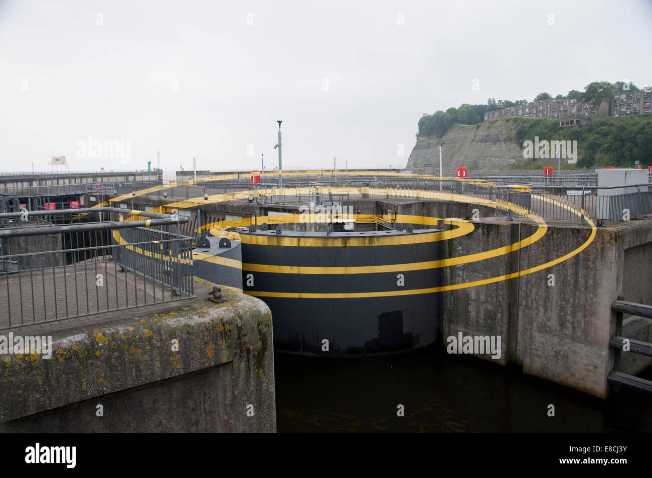Cardiff Bay barrage optical illusion.  Swiss artist Felice Varini created this public art, a series of three yellow ellipses. Stock Photo