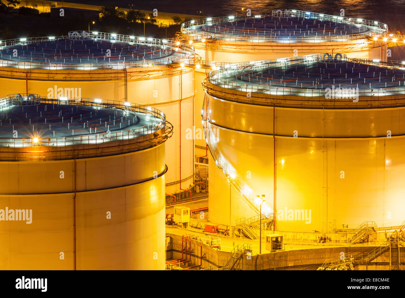 Fuel tanks at night Stock Photo Alamy