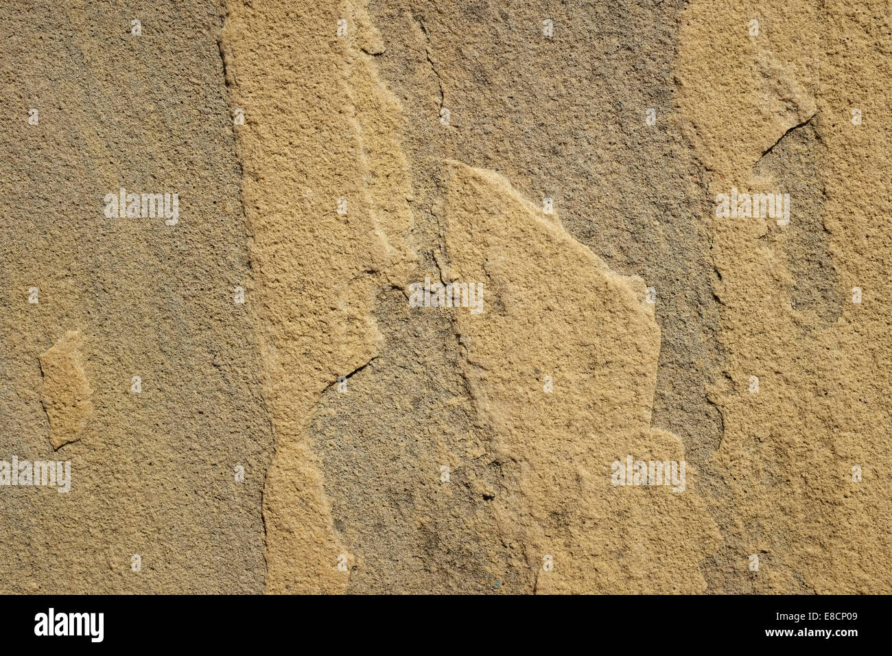 Rough yellow sandstone slab as abstract background texture Stock Photo