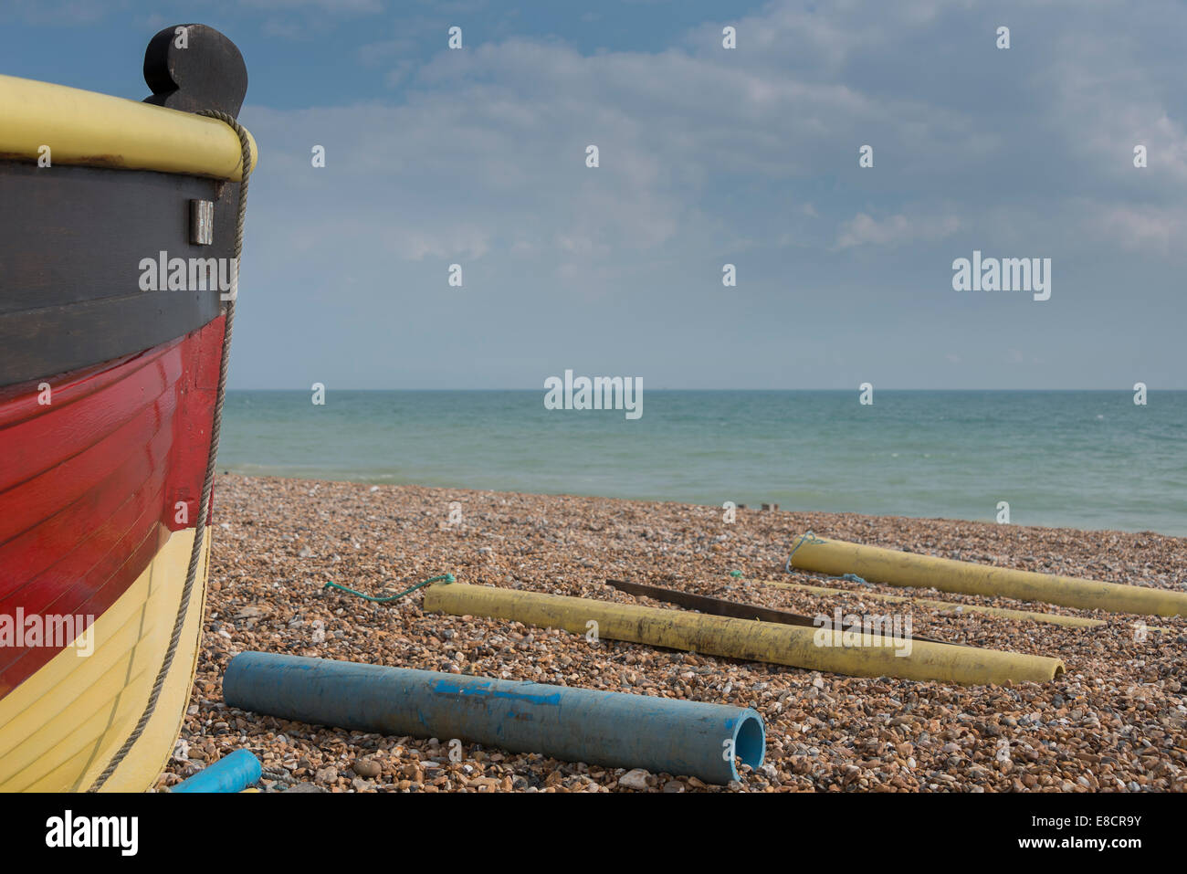 A brightly painted fishing boat on Worthing Beach Stock Photo - Alamy