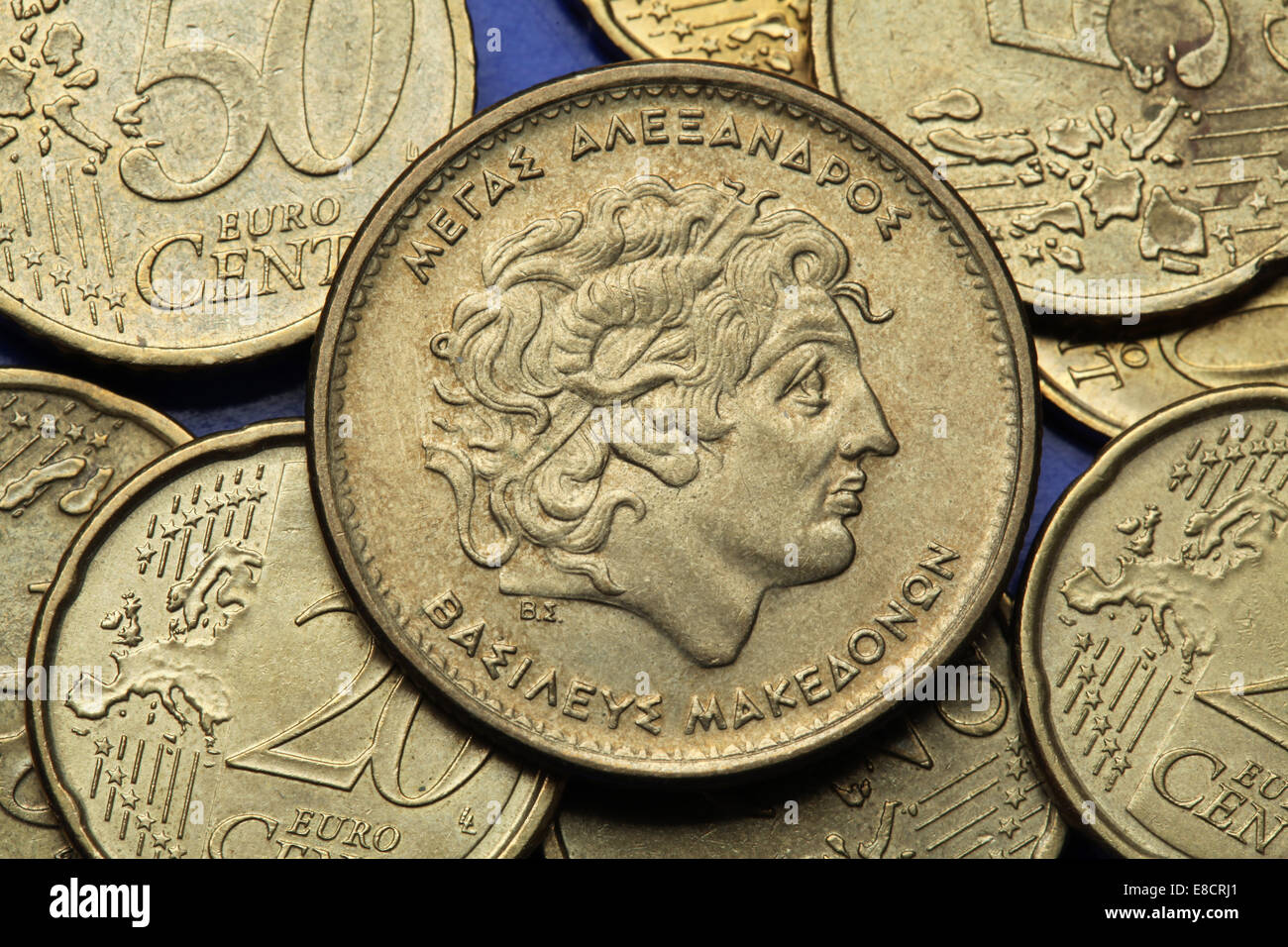 Coins of Greece. Alexander the Great depicted in the old Greek 100 drachma coin. Stock Photo