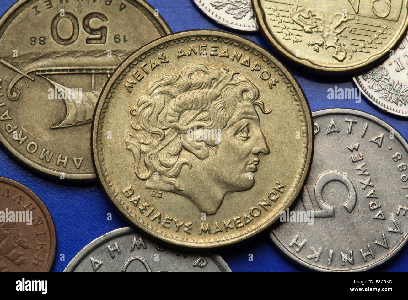 Coins of Greece. Alexander the Great depicted in the old Greek 100 drachma coin. Stock Photo