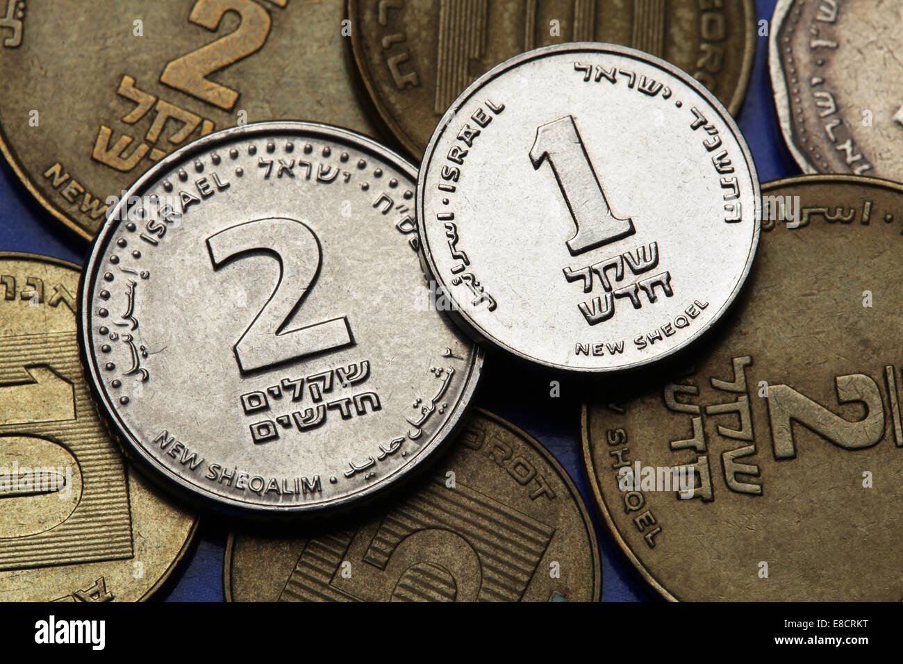 Coins of Israel. Israeli one and two new shekels coins. Stock Photo