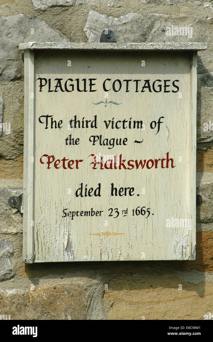 Eyam plague cottages sign Stock Photo