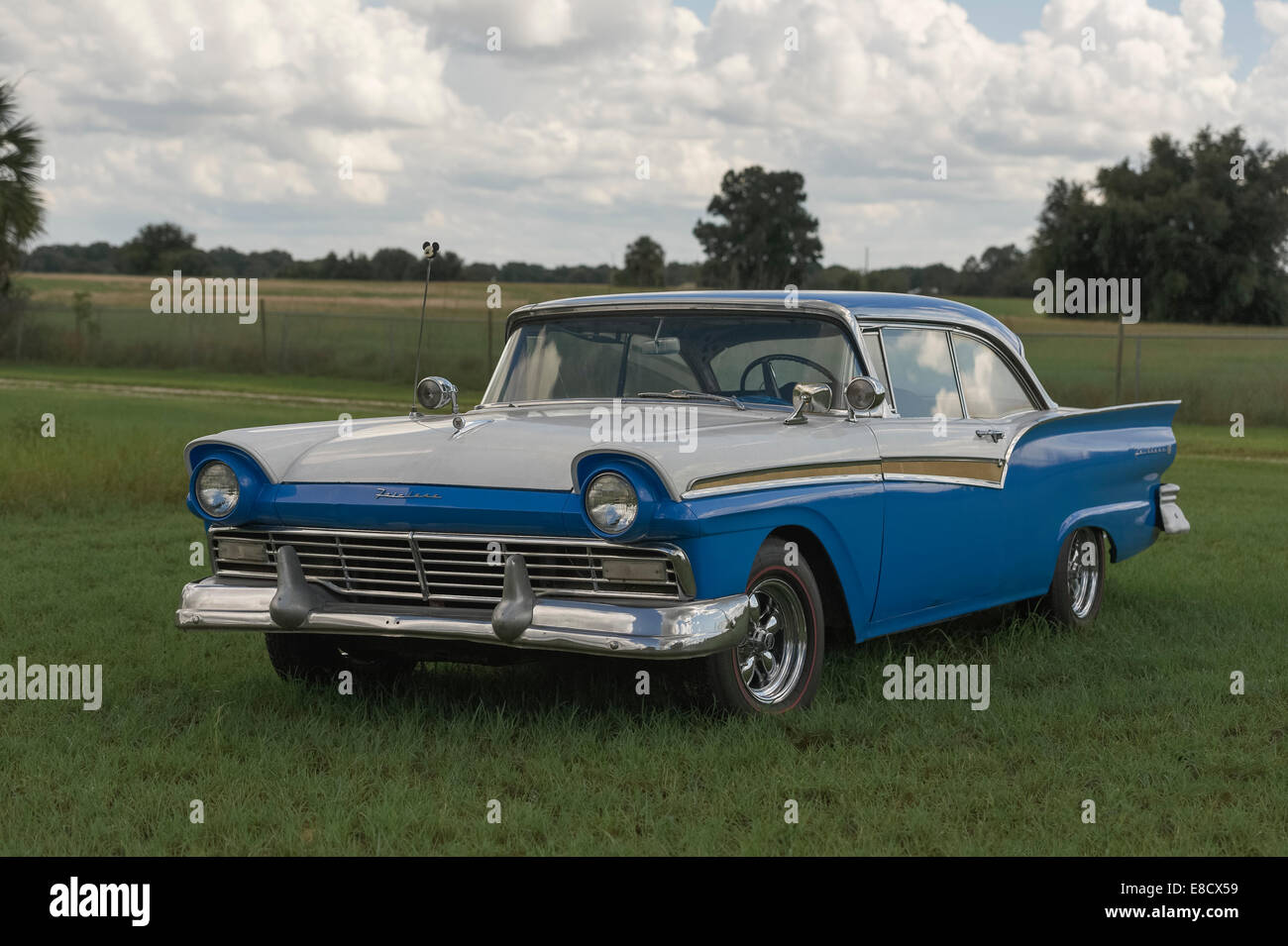 1957 Ford Fairlane parked in a grass field located in Lake County, Florida USA Stock Photo