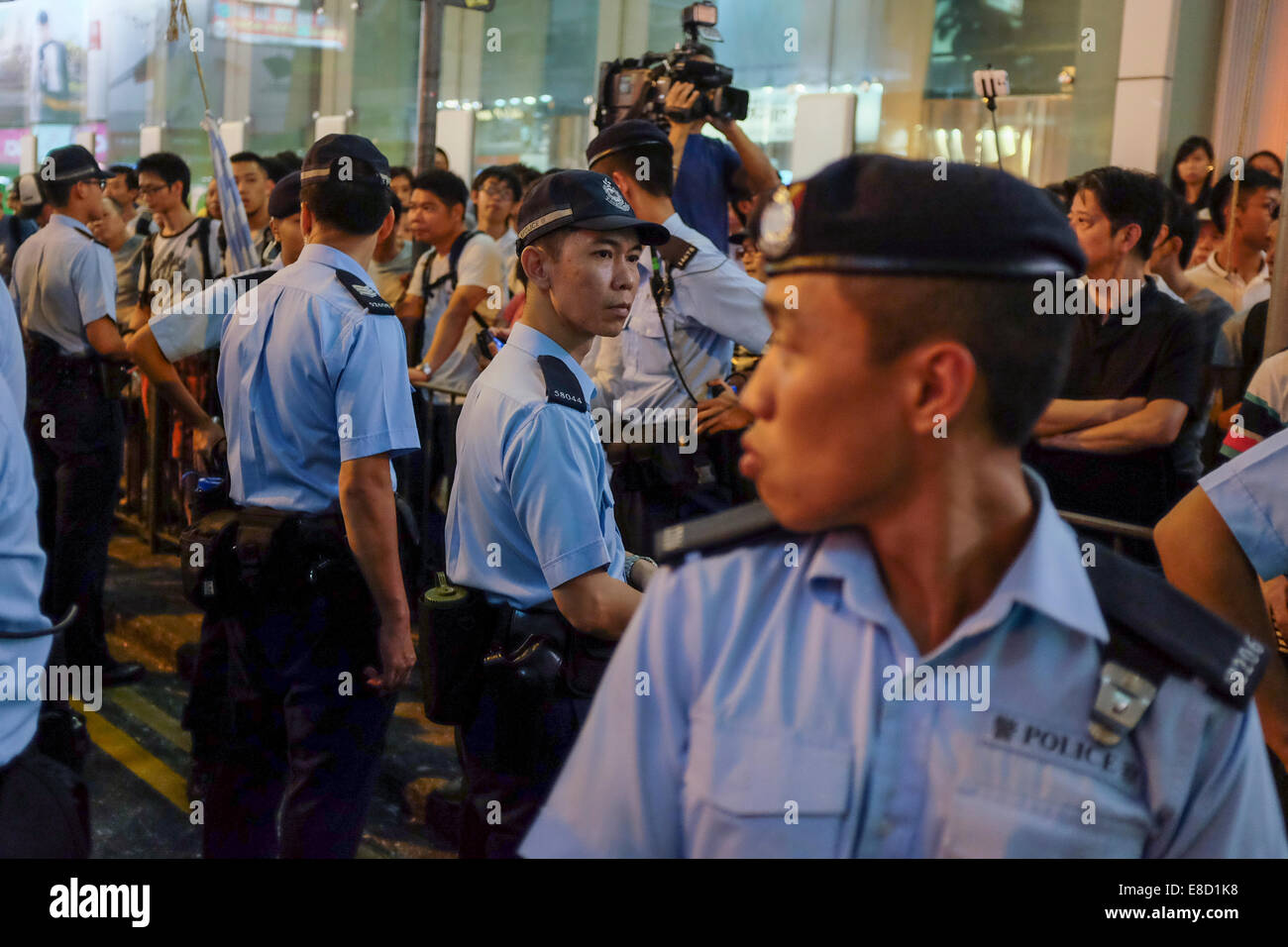 Police control crowds as pro democracy protests continue in Mongkok, in Hong Kong on 05 October, 2014. Stock Photo