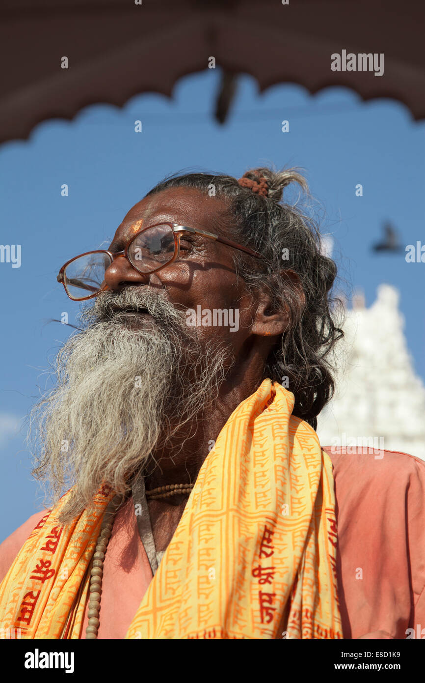 Bearded Sadu holy man at Hindu temple in the holy city of Pushkar, Rajasthan, India Stock Photo