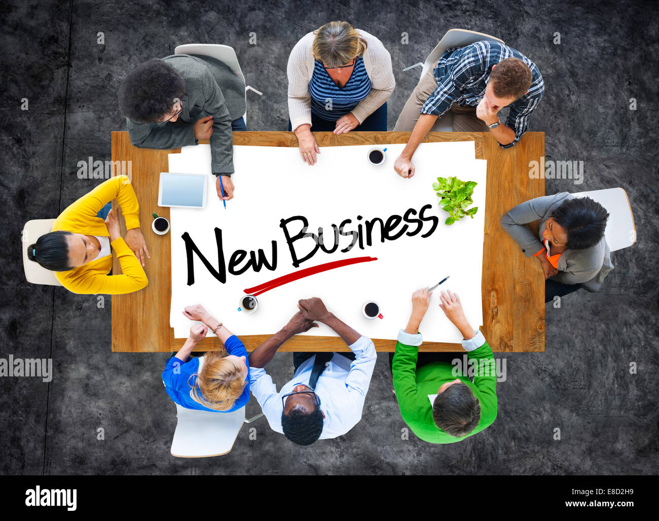 Group of People Brainstorming about New Business Concept Stock Photo