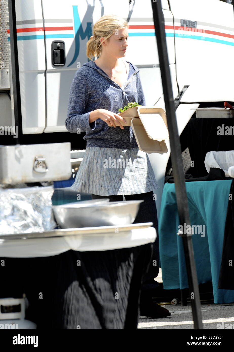 Actress Maggie Grace spotted grabbing lunch on the set of 'Taken 3' filming in downtown Los Angeles.  Featuring: Maggie Grace Where: Los Angeles, California, United States When: 02 Apr 2014 Stock Photo