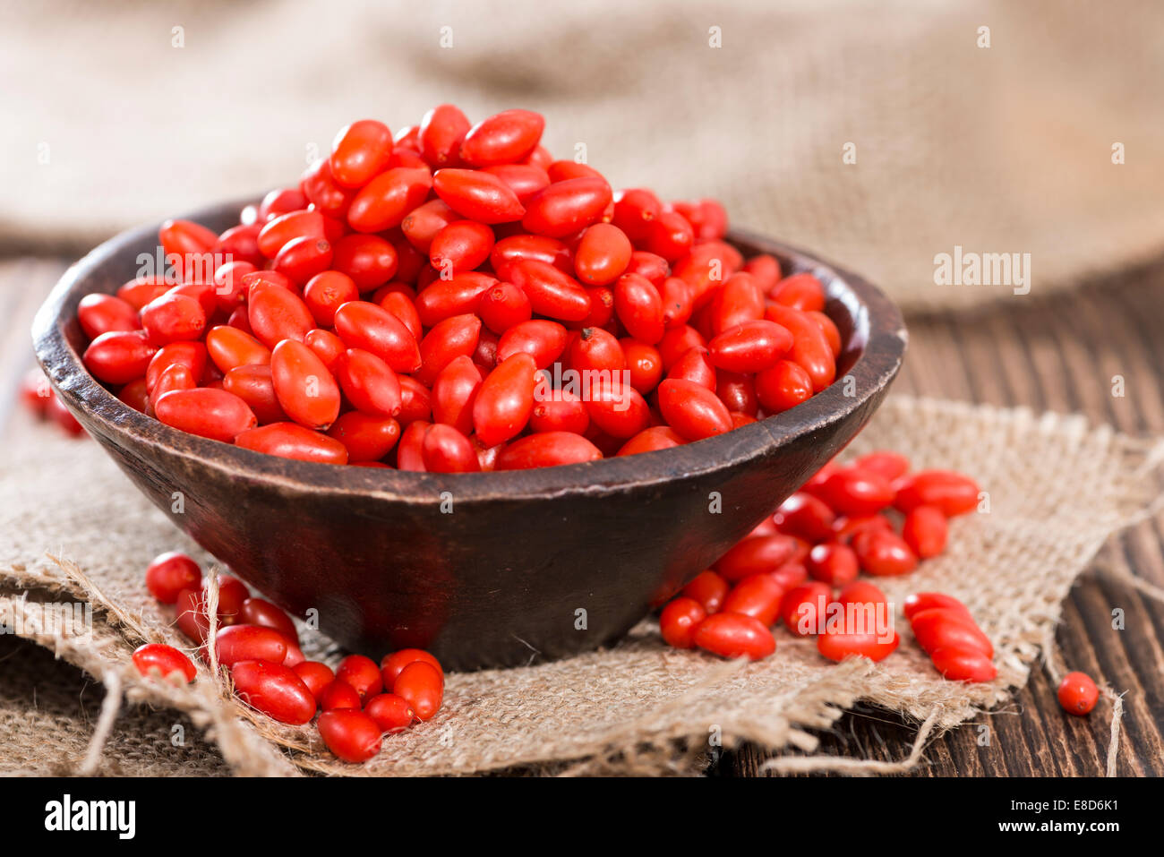 Fresh Goji Some fresh Goji Berries (also known as Wolfberry) on vintage wooden ...