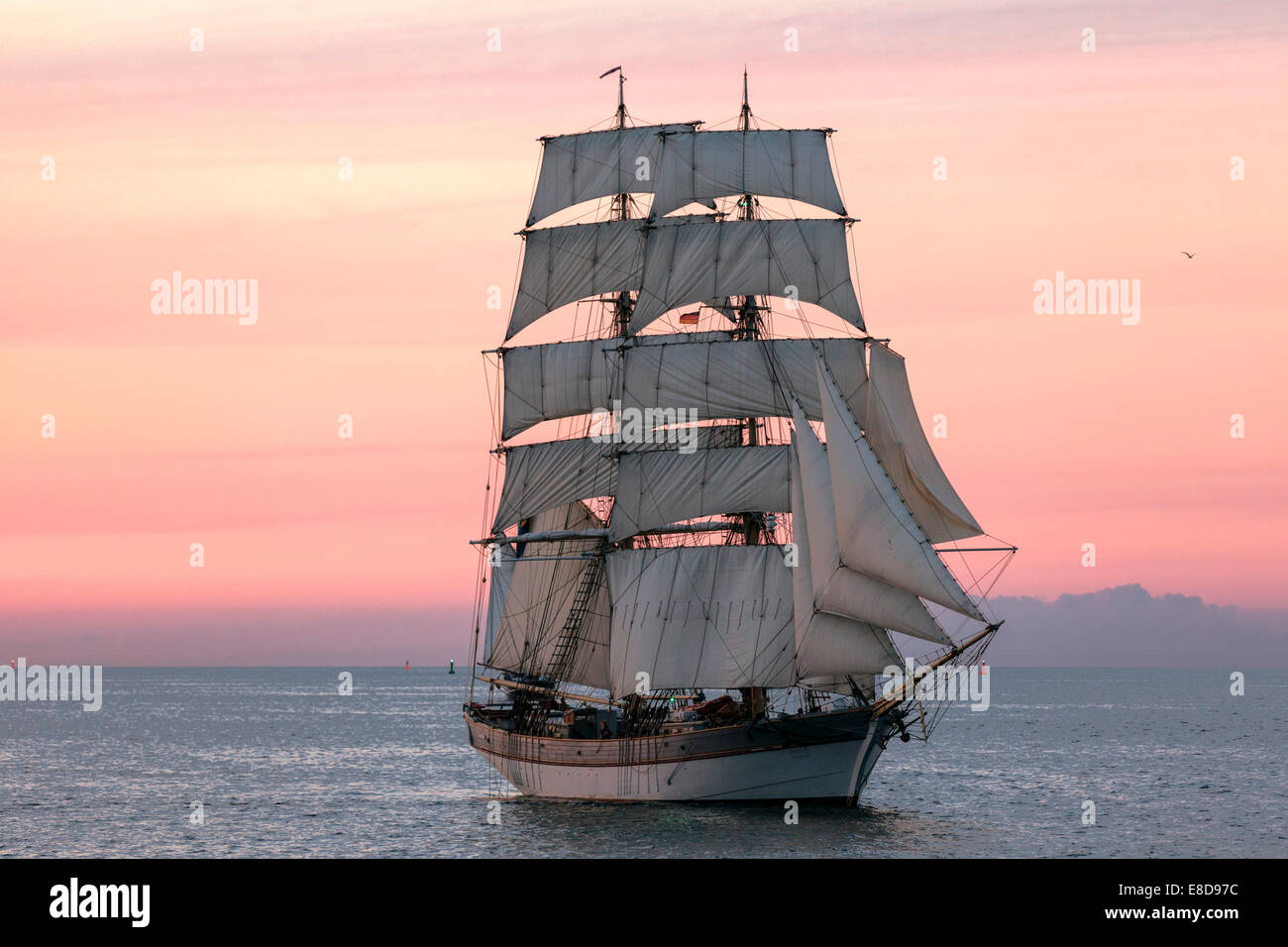 Evening sailing with a twomaster in full sail at the Hanse Sail 2014