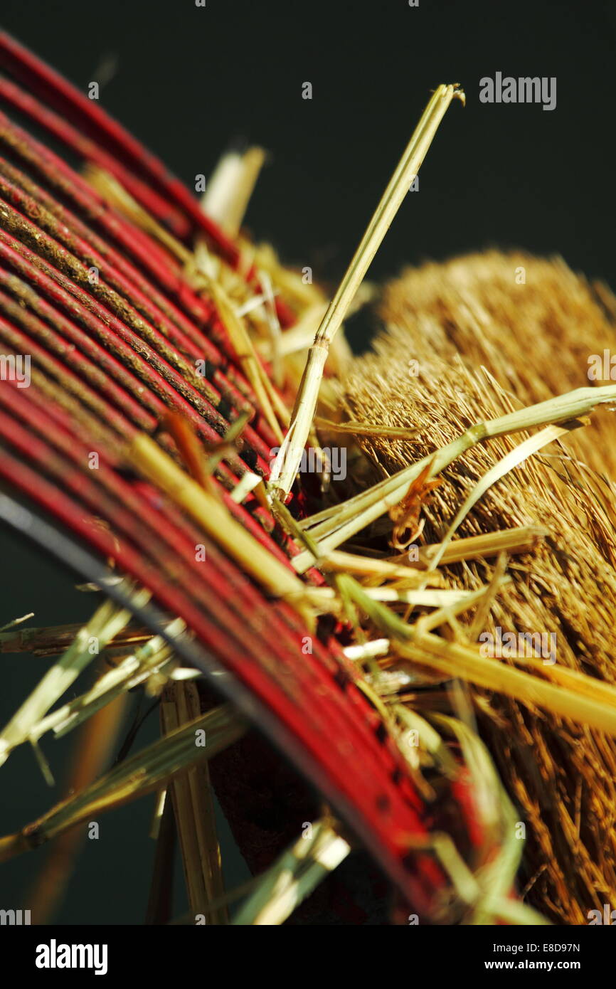 A muck rake and straw broom for cleaning livestock stalls at the Perth Royal Show, Western Australia. Stock Photo