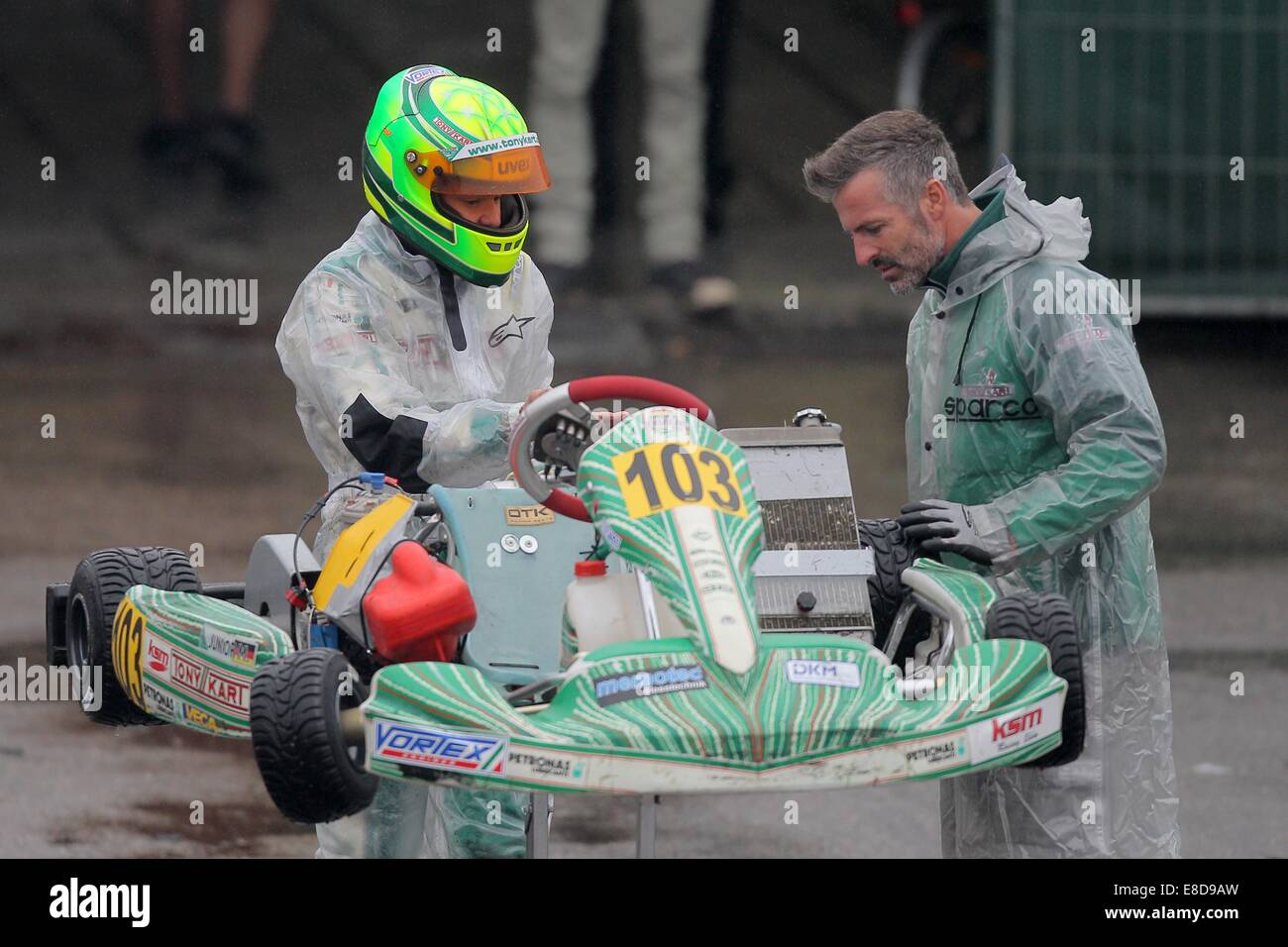 Mick Schumacher (l) of Germany, named as Mick Junior, of KSM Racing Team talks to a technican during the DJKM race at the German Karting Championship on 05 October 2014, in Genk, Belgium. Photo: Fredrik von Erichsen/dpa ( - MANDATORY CREDITS) Stock Photo