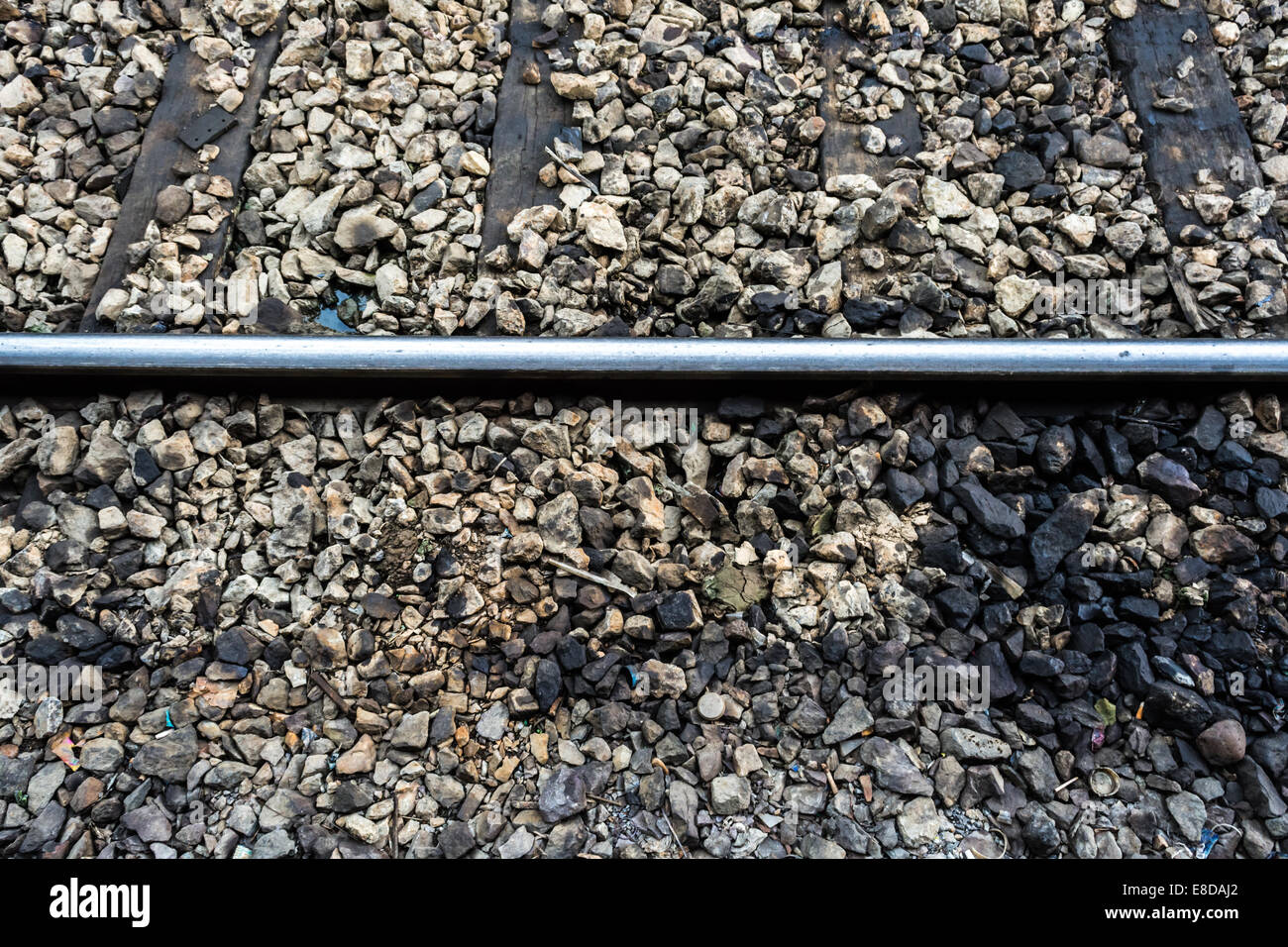 Stone on railroad track Stock Photo Alamy