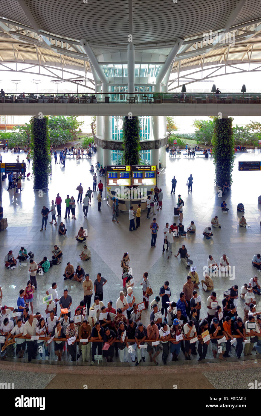 Concourse, arrival with waiting greeters, Ngurah Rai Airport or Denpasar International Airport, Tuban, Bali, Indonesia Stock Photo