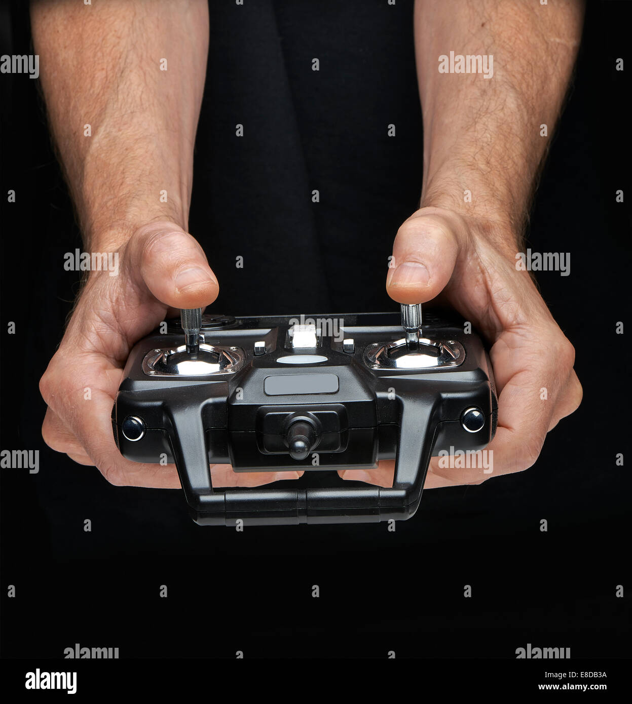 Hands manipulate the radio-control for toy Stock Photo