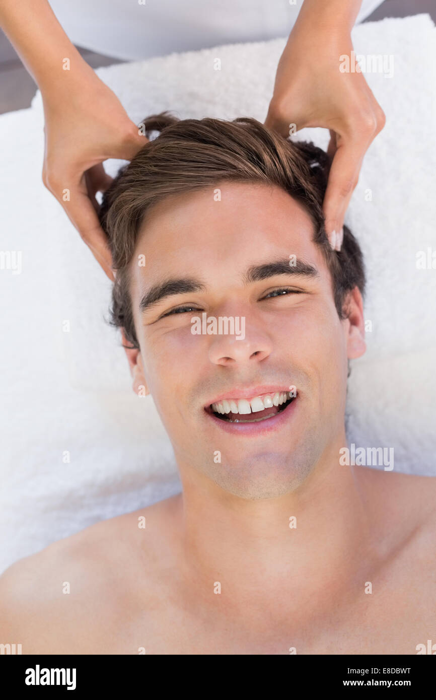Man receiving head massage at spa center Stock Photo Alamy