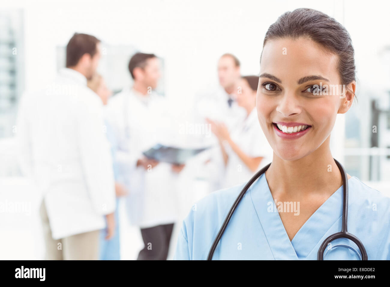 Portrait of smiling female doctor hi-res stock photography and images ...