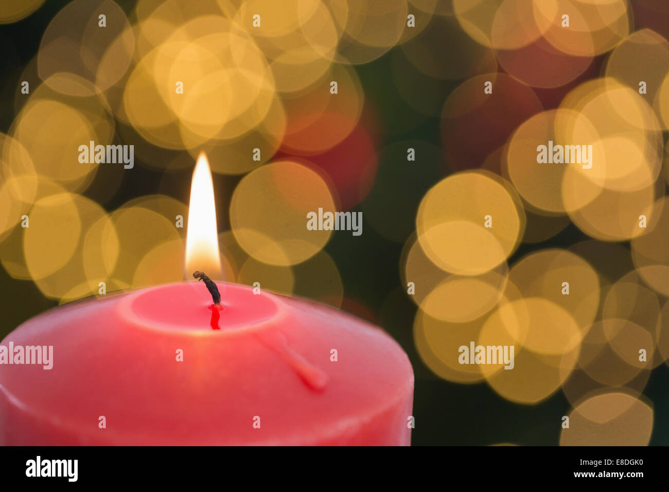 Large red candle burning bright Stock Photo Alamy