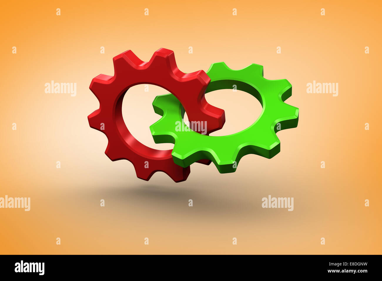 Composite image of green and red cog and wheel Stock Photo