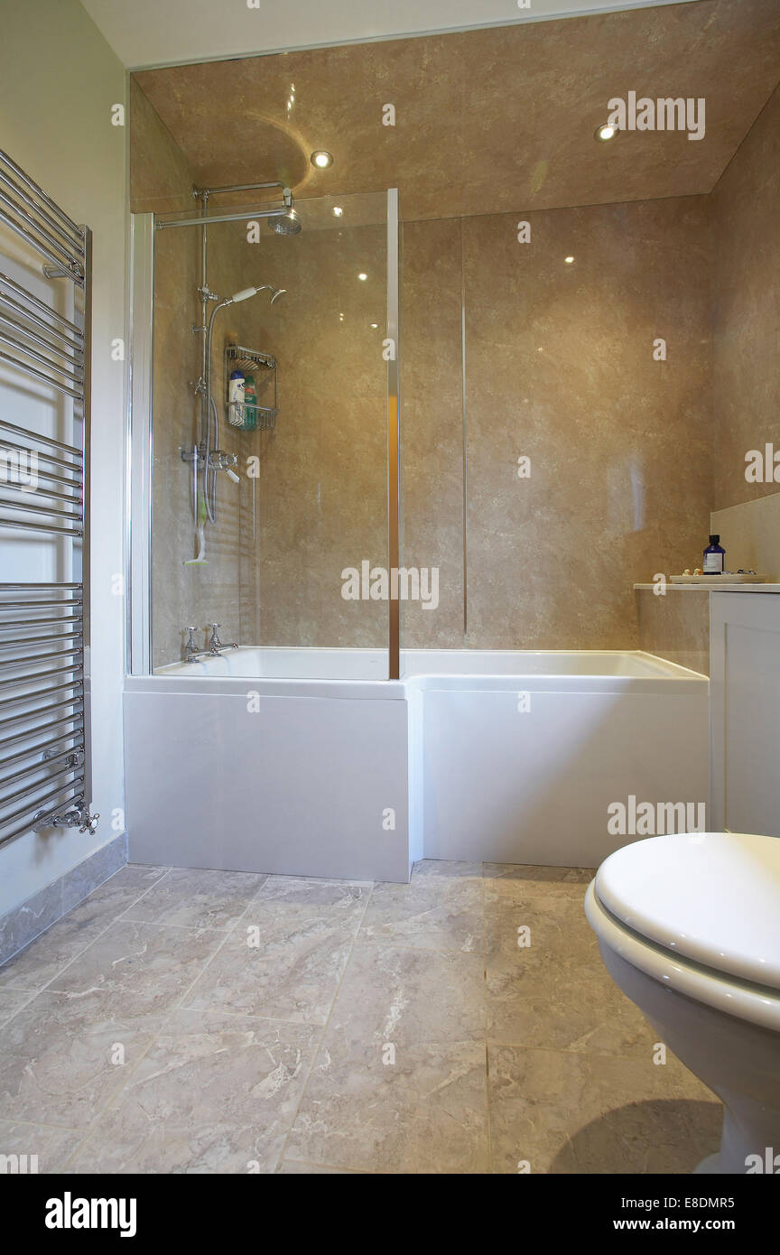 A modern stylish bathroom interior with shower in a home in the UK ...